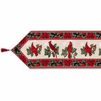 Cardinal and mistletoe motif on a Christmas holiday table runner